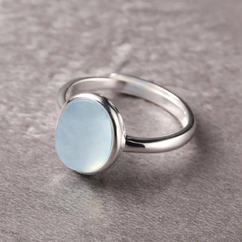 TZgrams 925 Sterling Silver Каблучка з аквамарином Овальний блакитний камінь Прості елегантні корейські модні каблучки з місячним камінням Ювелірні TZgrams 925 Sterling Silver Каблучка з аквамарином Овальний блакитний камінь Прості елегантні корейські модні каблучки з місячним камінням Ювелірні